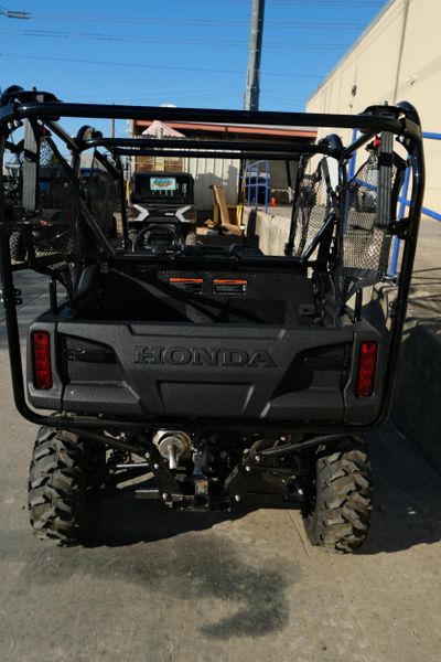 NEW 2026 HONDA PIONEER 7004  in a HERO RED exterior color. Family PowerSports (877) 886-1997 familypowersports.com