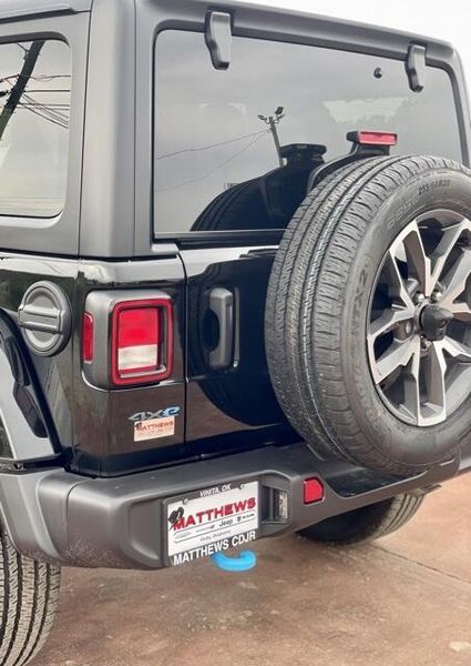 2024 Jeep Wrangler 4-door Sport S 4xe in a Black Clear Coat exterior color and Blackinterior. Matthews Chrysler Dodge Jeep Ram 918-276-8729 cyclespecialties.com 