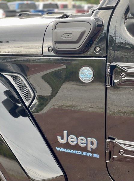 2024 Jeep Wrangler 4-door Sport S 4xe in a Black Clear Coat exterior color and Blackinterior. Matthews Chrysler Dodge Jeep Ram 918-276-8729 cyclespecialties.com 