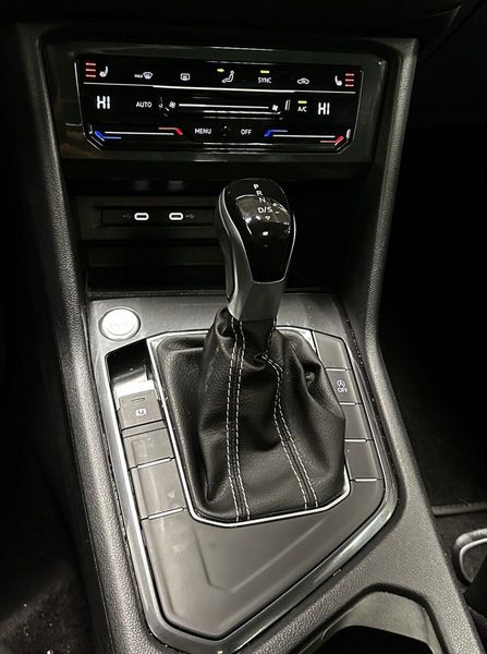 2023 Volkswagen Tiguan SE w/Sunroof & 3rd Row in a Deep Black Pearl exterior color and Black Heated Seatsinterior. Schmelz Countryside Alfa Romeo and Fiat (651) 968-0556 schmelzfiat.com 