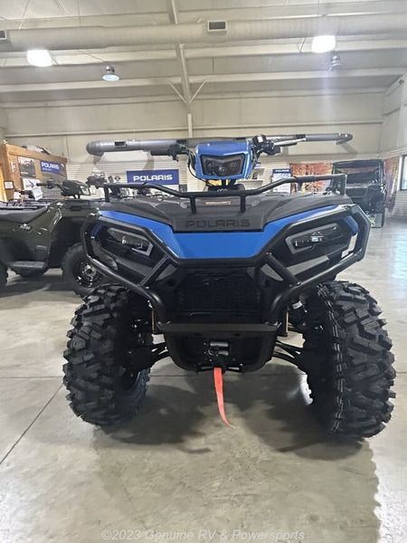 2024 Polaris Sportsman 570 Trail in a ELECTRIC BLUE exterior color. Genuine RV & Powersports (936) 569-2523 