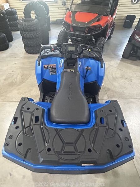 2024 Polaris Sportsman 570 Trail in a ELECTRIC BLUE exterior color. Genuine RV & Powersports (936) 569-2523 
