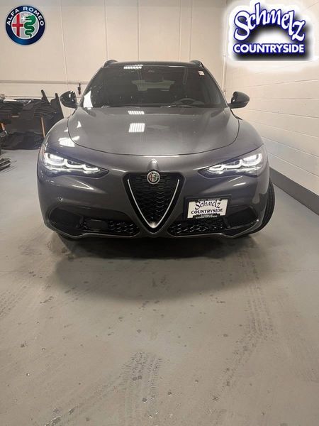 2024 Alfa Romeo Stelvio Ti Awd in a Vesuvio Gray Metallic exterior color and Black Heated Leatherinterior. Schmelz Countryside Alfa Romeo (651) 867-3222 schmelzalfaromeo.com 