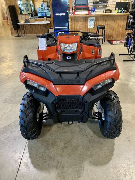 2024 Polaris Sportsman 450 H.O. EPS in a Orange exterior color. Genuine RV & Powersports (936) 569-2523 