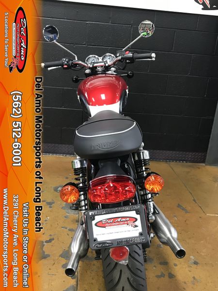 2023 Triumph BONNEVILLE T100  in a CARNIVAL RED/FUSION WHITE exterior color. Del Amo Motorsports of Long Beach (562) 362-3160 delamomotorsports.com 