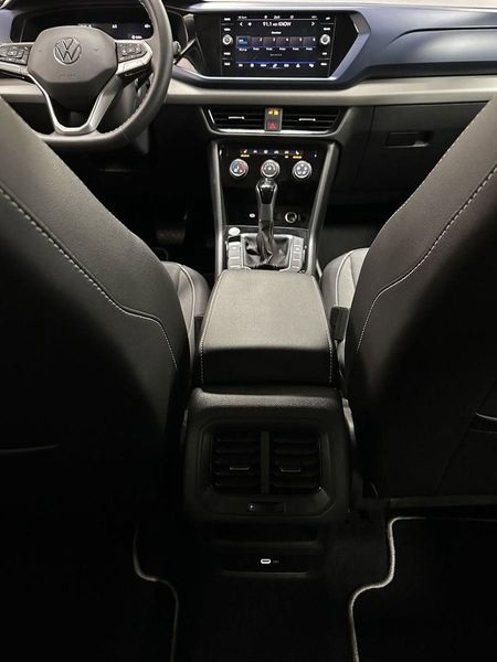 2023 Volkswagen Taos SE 4-Motion AWD w/Black Wheel Pkg in a Kings Red Metallic exterior color and Black heated seatsinterior. Schmelz Countryside Alfa Romeo and Fiat (651) 968-0556 schmelzfiat.com 
