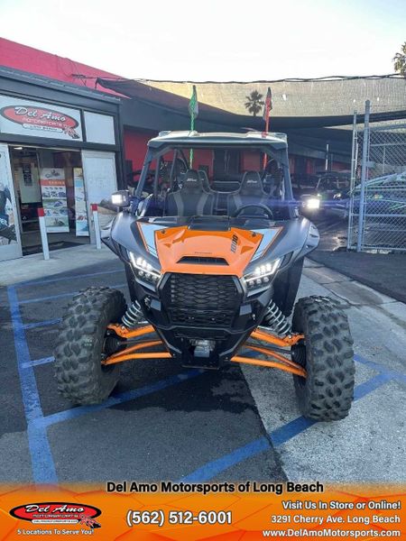 2023 Kawasaki KRT1000APFNL  in a METALLIC FLAT RAW GRAYSTONE/CANDY STEEL FURNACE ORANGE exterior color. Del Amo Motorsports of Long Beach (562) 362-3160 delamomotorsports.com 