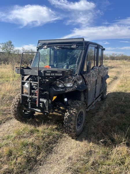 2025 CAN-AM DEFENDER MAX LIMITED CAB HD10 WILDLAND CAMO in a WILDLAND CAMO exterior color. Family PowerSports (877) 886-1997 familypowersports.com 