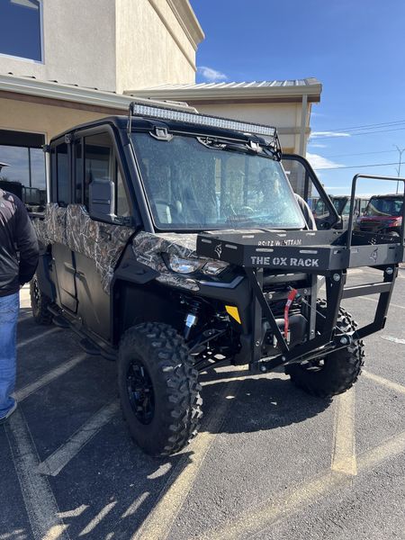 2025 CAN-AM DEFENDER MAX LIMITED CAB HD10 WILDLAND CAMO in a WILDLAND CAMO exterior color. Family PowerSports (877) 886-1997 familypowersports.com 