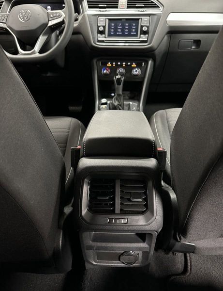 2023 Volkswagen Tiguan S / Driver Asst Pkg in a Deep Black Pearl exterior color and Black Heated Seatsinterior. Schmelz Countryside Alfa Romeo and Fiat (651) 968-0556 schmelzfiat.com 