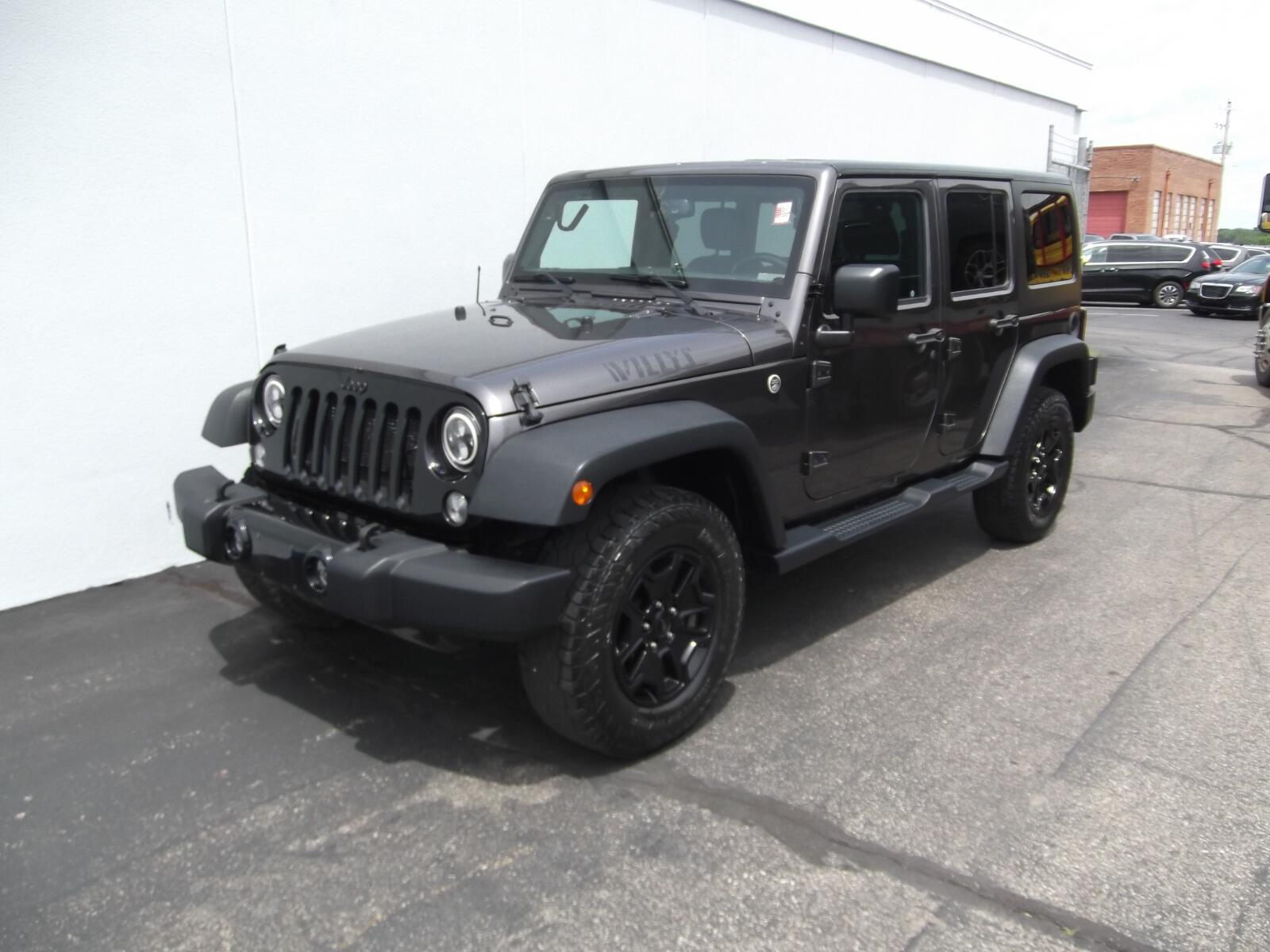 Used 2016 Jeep Wrangler Unlimited Willys Wheeler with VIN 1C4HJWDGXGL224475 for sale in Kansas City