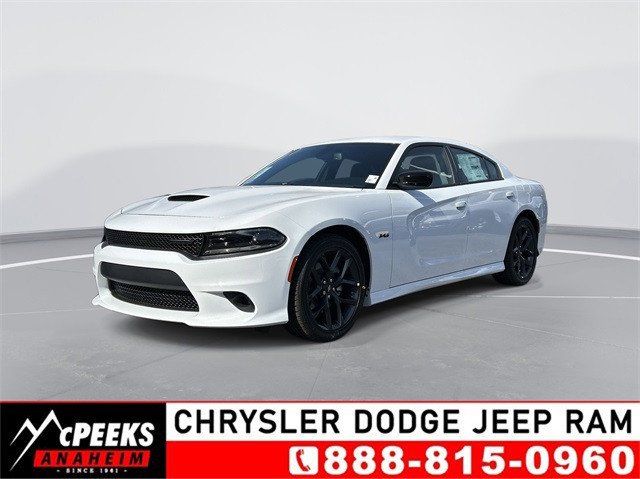 2023 Dodge Charger R/T in a White Knuckle exterior color and Blackinterior. McPeek