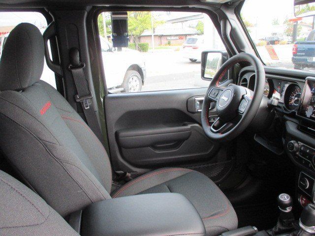 2024 Jeep Wrangler 4-door Rubicon in a Sarge Green Clear Coat exterior color and Blackinterior. Oak Harbor Motors Inc. 360-323-6434 ohmotors.com 