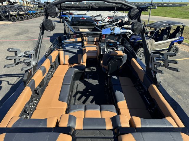 2024 MALIBU WAKESETTER 23 LSV  in a BLACK/TEAL exterior color. Family PowerSports (877) 886-1997 familypowersports.com 