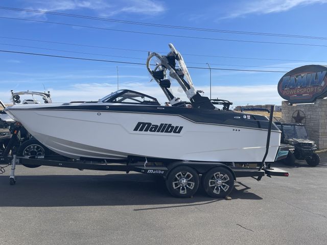 2023 MALIBU M220  in a BLACK/WHITE exterior color. Family PowerSports (877) 886-1997 familypowersports.com 