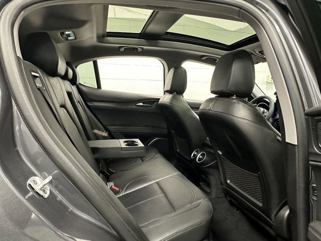 2021 Alfa Romeo Stelvio Sprint AWD w/Sunroof & Sound in a Vesuvio Gray Metallic exterior color and Black Heated Leatherinterior. Schmelz Countryside Alfa Romeo (651) 867-3222 schmelzalfaromeo.com 