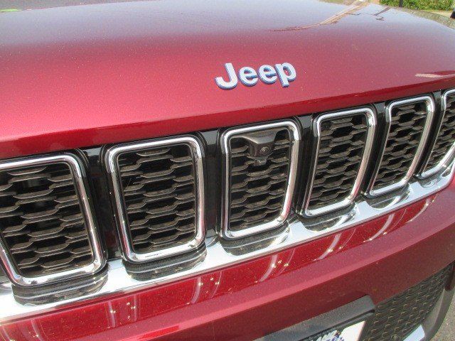 2023 Jeep Grand Cherokee 4xe in a RED exterior color and BLACKinterior. Oak Harbor Motors Inc. 360-323-6434 ohmotors.com 