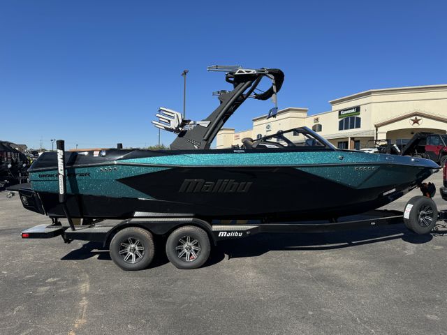 2024 MALIBU WAKESETTER 23 LSV  in a BLACK/TEAL exterior color. Family PowerSports (877) 886-1997 familypowersports.com 