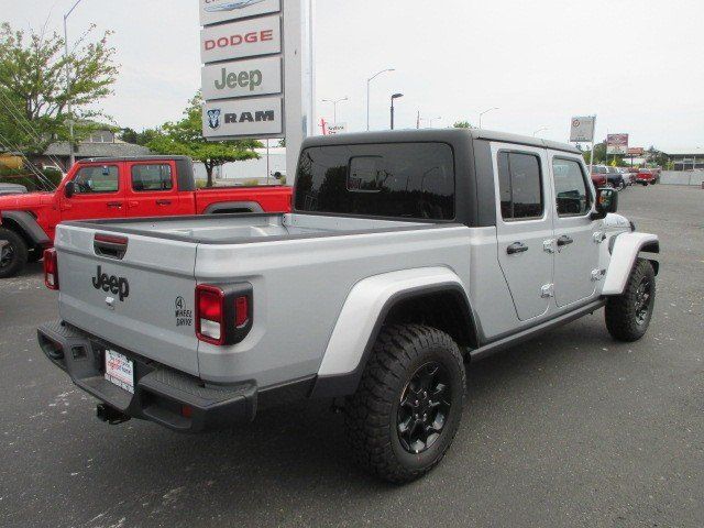 2023 Jeep Gladiator Willys 4x4 in a Silver Zynith Clear Coat exterior color and Blackinterior. Oak Harbor Motors Inc. 360-323-6434 ohmotors.com 