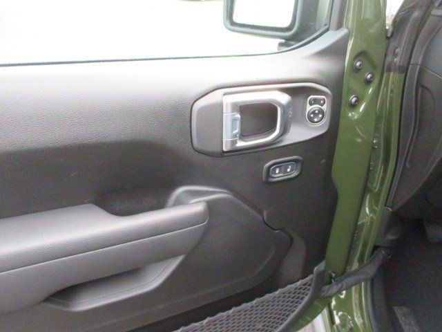 2024 Jeep Wrangler 4-door Rubicon in a Sarge Green Clear Coat exterior color and Blackinterior. Oak Harbor Motors Inc. 360-323-6434 ohmotors.com 