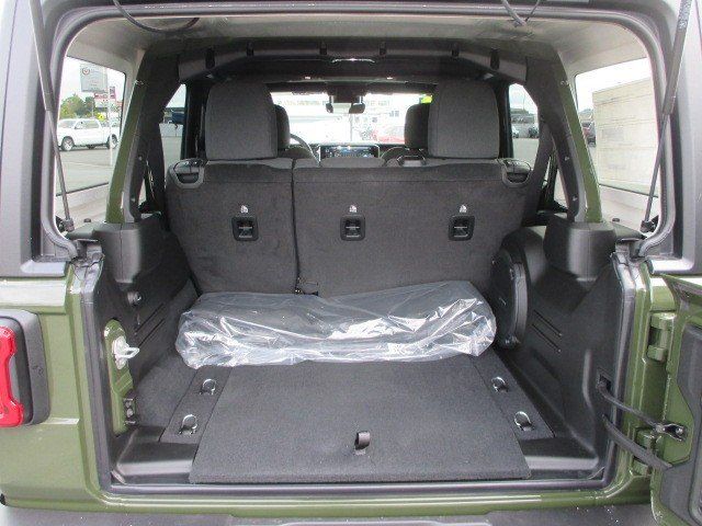 2024 Jeep Wrangler 4-door Rubicon in a Sarge Green Clear Coat exterior color and Blackinterior. Oak Harbor Motors Inc. 360-323-6434 ohmotors.com 