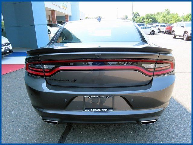 2023 Dodge Charger SXT in a Granite exterior color and Blackinterior. Papas Jeep Ram In New Britain, CT 860-356-0523 papasjeepram.com 