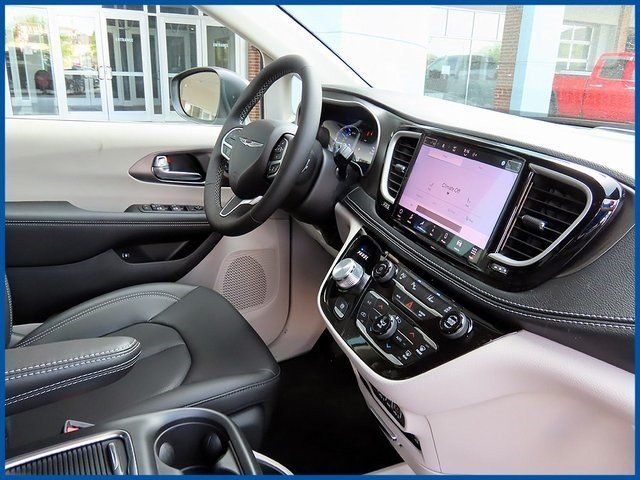 2023 Chrysler Pacifica Hybrid Touring L in a Granite Crystal Metallic Clear Coat exterior color and Black/Alloy/Blackinterior. Papas Jeep Ram In New Britain, CT 860-356-0523 papasjeepram.com 