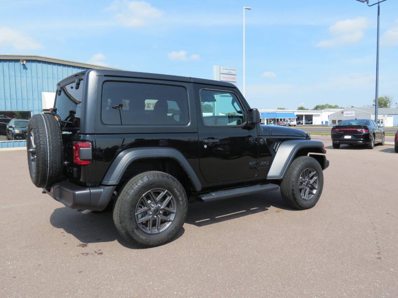 Used 2024 Jeep Wrangler 2-Door Sport S with VIN 1C4PJXAG8RW359932 for sale in Fairmont, Minnesota