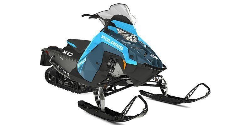 2024 Polaris Switchback XC in a Zenith Blue/Sky Blue exterior color. New England Powersports 978 338-8990 pixelmotiondemo.com 