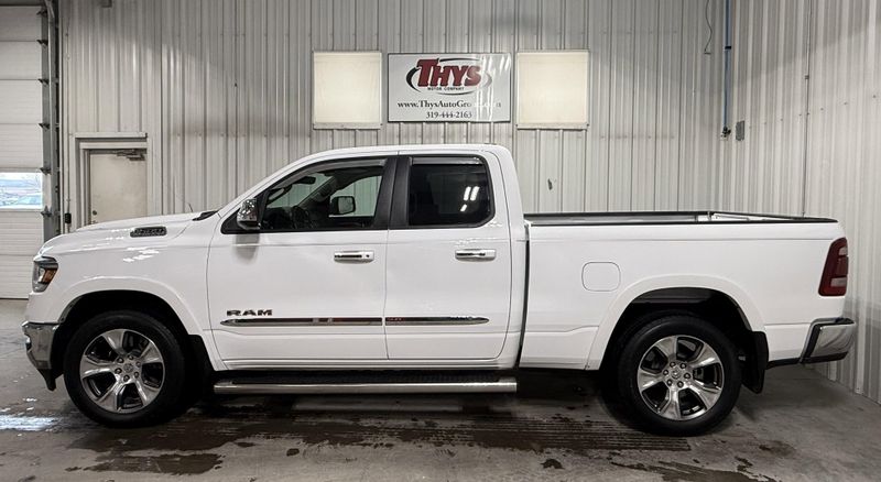 Used 2020 RAM 1500 Laramie in a Bright White Clear Coat exterior color and Blackinterior. Thys Motor Company 319-318-6640 thysmotorco.com 