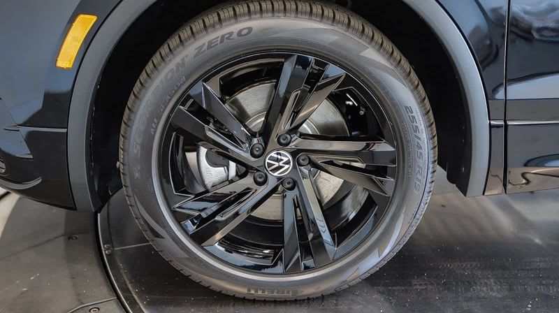 2024 Volkswagen Tiguan SE R-Line Black in a Deep Black Pearl exterior color and Storm Grayinterior. BEACH BLVD OF CARS beachblvdofcars.com 
