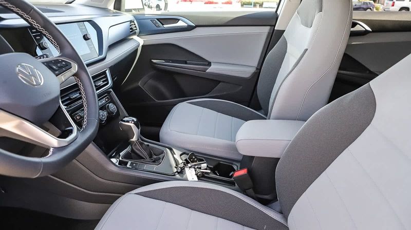 2024 Volkswagen Taos SE in a Pure White exterior color and Grayinterior. BEACH BLVD OF CARS beachblvdofcars.com 