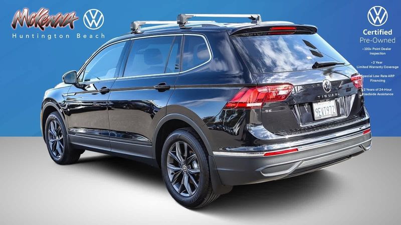 2023 Volkswagen Tiguan SE in a Deep Black Pearl exterior color and Titan Blackinterior. BEACH BLVD OF CARS beachblvdofcars.com 
