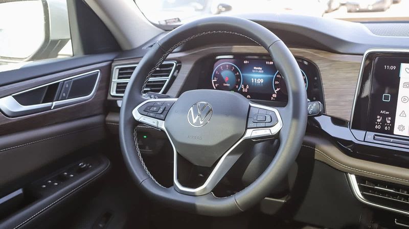 2024 Volkswagen Atlas 2.0T SEL in a White exterior color. BEACH BLVD OF CARS beachblvdofcars.com 