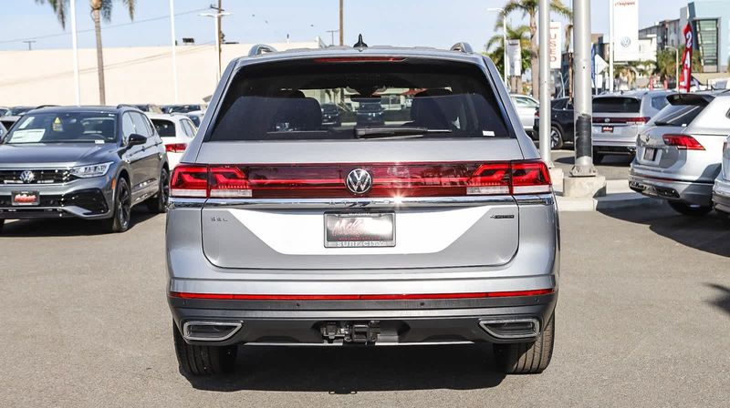 2024 Volkswagen Atlas 2.0T SEL in a Silver Mist Metallic exterior color and French Roast/Blackinterior. BEACH BLVD OF CARS beachblvdofcars.com 