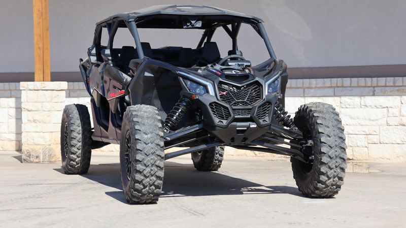 2025 CAN-AM MAVERICK X3 X RS TURBO RR WITH SMARTSHOX TRIPLE BLACK in a TRIPLE BLACK exterior color. Family PowerSports (877) 886-1997 familypowersports.com 