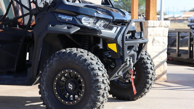 2024 CAN-AM SSV DEF MAX TEX 65 HD10 BK 24 in a BLACK exterior color. Family PowerSports (877) 886-1997 familypowersports.com 