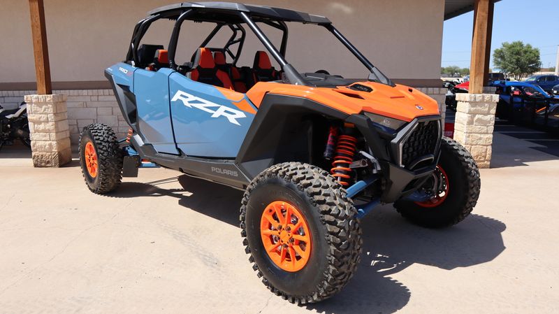 New 2025 Polaris RZR PRO S 4 ULTIMATE ORANGE RUST AND ZENITH BLUE Image 1