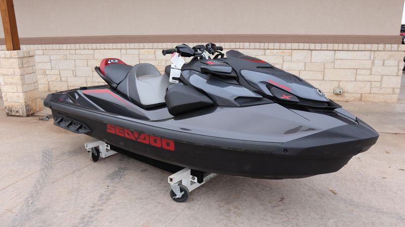 2025 SEADOO GTRX 300 WITH SOUND SYSTEM ECLIPSE BLACK AND DEEP MARSALA Image 1