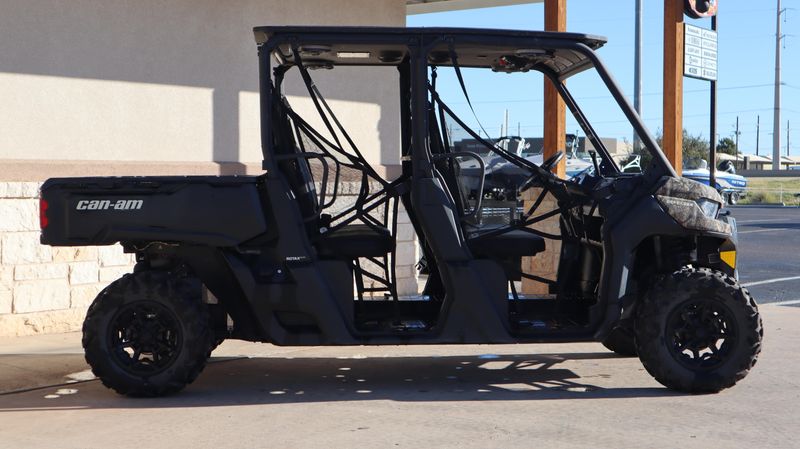 2023 CAN-AM DEFENDER MAX DPS 62 HD9 in a CAMO exterior color. Family PowerSports (877) 886-1997 familypowersports.com 