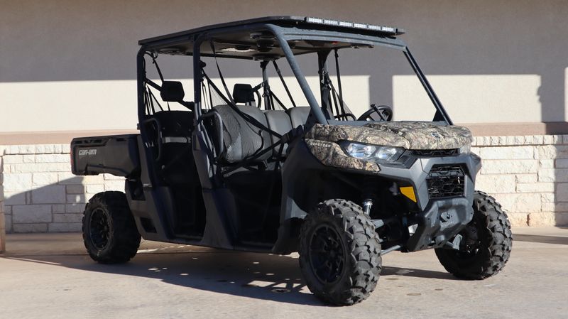 2023 CAN-AM DEFENDER MAX DPS 62 HD9 in a CAMO exterior color. Family PowerSports (877) 886-1997 familypowersports.com 