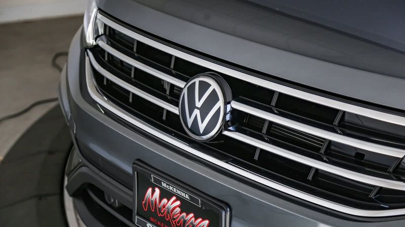 2024 Volkswagen Tiguan SE in a Platinum Gray Metallic exterior color and Titan Blackinterior. BEACH BLVD OF CARS beachblvdofcars.com 