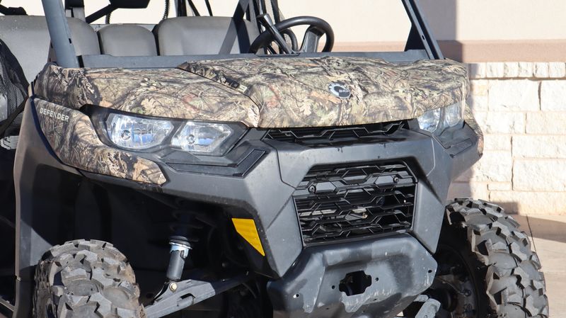 2023 CAN-AM DEFENDER MAX DPS 62 HD9 in a CAMO exterior color. Family PowerSports (877) 886-1997 familypowersports.com 