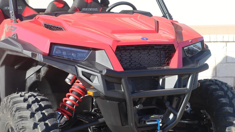 2025 POLARIS GENERAL XP 4 1000 PREMIUM INDY RED in a INDY RED exterior color. Family PowerSports (877) 886-1997 familypowersports.com 