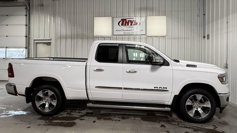 Used 2020 RAM 1500 Laramie in a Bright White Clear Coat exterior color and Blackinterior. Thys Motor Company 319-318-6640 thysmotorco.com 