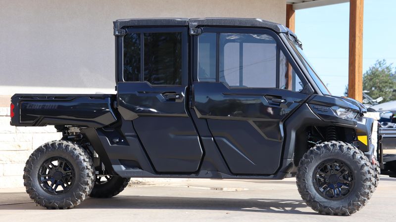 2025 CAN-AM DEFENDER MAX LONE STAR CAB HD10 STEALTH BLACK in a STEALTH BLACK exterior color. Family PowerSports (877) 886-1997 familypowersports.com 