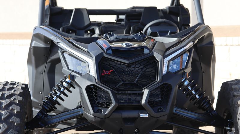 2025 CAN-AM MAVERICK X3 X RS TURBO RR WITH SMARTSHOX TRIPLE BLACK in a TRIPLE BLACK exterior color. Family PowerSports (877) 886-1997 familypowersports.com 