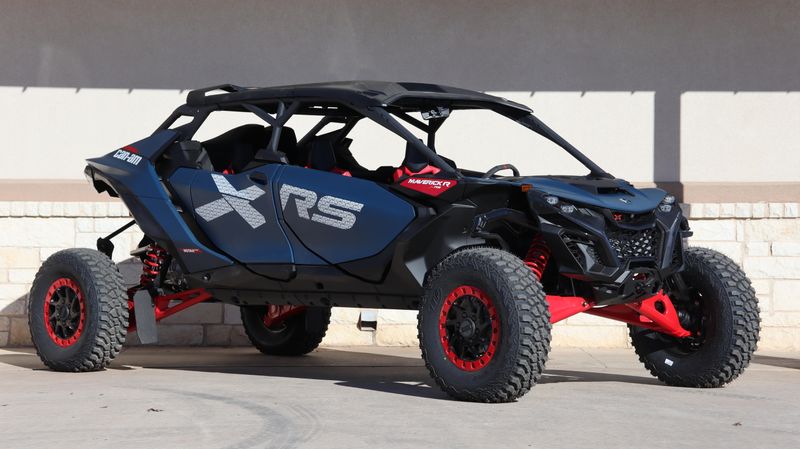 2025 Can-Am MAVERICK R MAX X RS WITH SMARTSHOX 999T DCT DUSTY NAVY AND LEGION REDImage 1