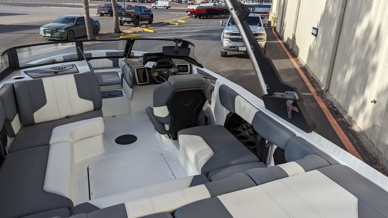 2024 MALIBU MB5472BOAT  in a WHITE/BLUE exterior color. Family PowerSports (877) 886-1997 familypowersports.com 