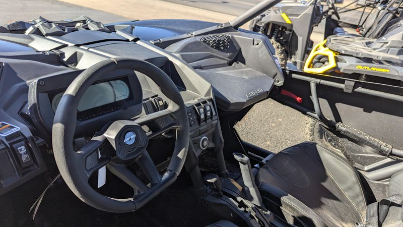 2025 CAN-AM MAVERICK X3 MAX X RS TURBO RR TRIPLE BLACK in a TRIPLE BLACK exterior color. Family PowerSports (877) 886-1997 familypowersports.com 